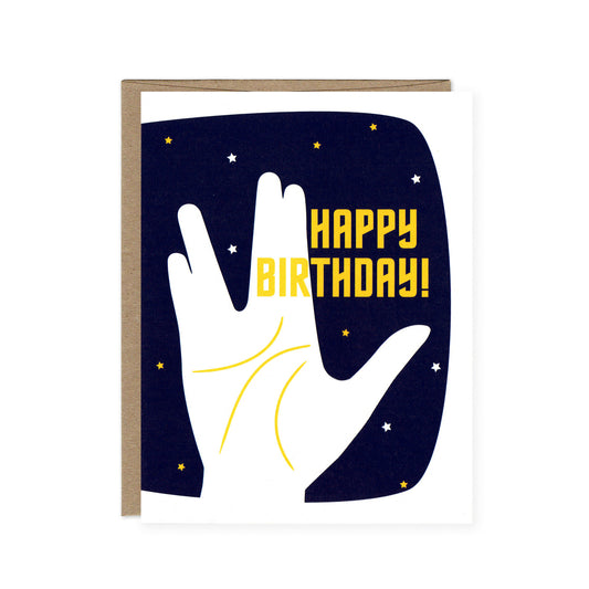 Yellow "Happy Birthday!" text next to Spock's famous hand sign in front of a starry sky